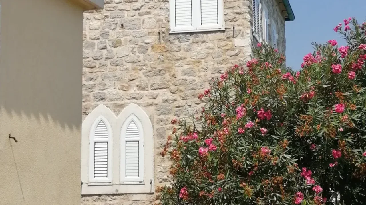 Stone houses and narrow lanes inside Budva's walled old town on the Montenegrin coast