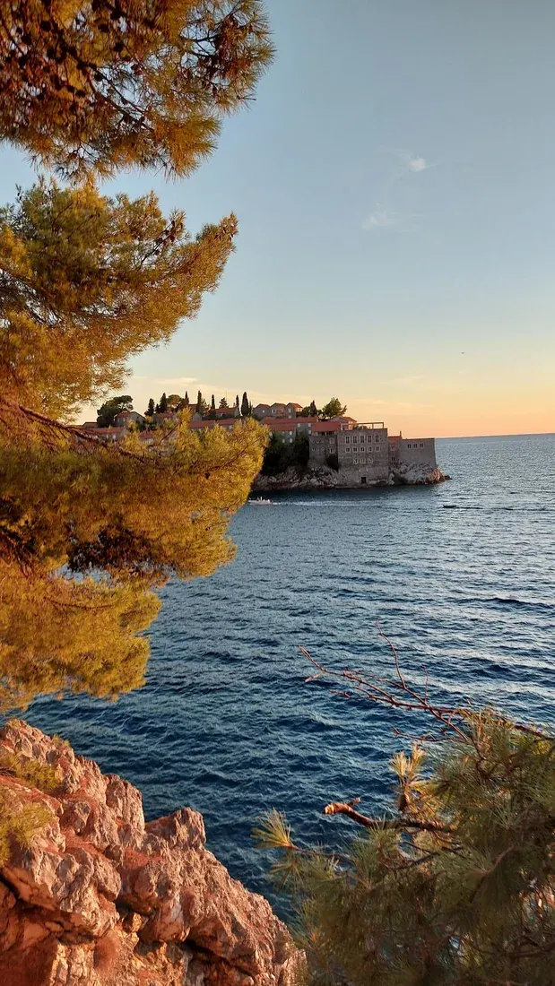 The fortified island resort of Sveti Stefan joined to the shore by its narrow isthmus