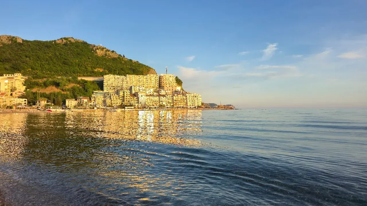 The coastal village of Rafailovići on its point above the Adriatic, at the south end of Bečići beach